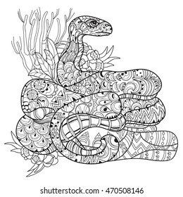 Hand drawn doodle outline anaconda decorated with ornaments.Vector zen art boho illustration.Floral ornament.Ready for adult anti stress coloring book.