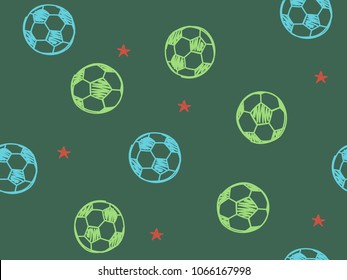 Hand drawn doodle seamless pattern with soccer balls on green background