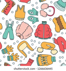 Hand drawn doodle seamless pattern of winter clothes. Vector 8 EPS