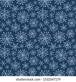 Hand drawn doodle seamless pattern. Violet snowflakes on a dark background. For fabric, textile, wrapping paper, card, invitation, wallpaper, web design. 