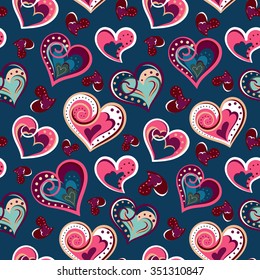 Hand drawn doodle seamless pattern of hearts. Pink hearts on navy blue background. Vector illustration