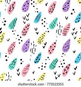 Hand drawn doodle seamless pattern with colorful water drops with brush strokes, stripes and dots. Childish texture for fabric, textile.Vector Illustration