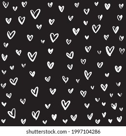 Hand drawn doodle seamless  vector pattern. White scribbles over black background digital texture. Marker or pen ink outline wallpaper. Geometric and abstract.