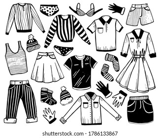 Hand drawn doodle set of clothes. Shirt, jumper, pants, jeans, t-shirt, undershirt, dress, skirt, gloves, socks. Vector illustration of hand drawn clothes isolated on white.