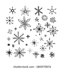 Hand drawn doodle snow flakes set. Vector illustration