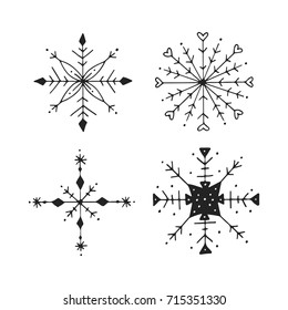 Hand drawn doodle snowflake winter set. Cute Christmas vector illustration.