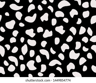 Hand Drawn Doodle Spots. Funky Dalmatian Print. Cow Skin Texture. Original Seamless Spotted Pattern. White Stains Isolated on Black. Animal Print. Liquid Shapes Banner. Black and White