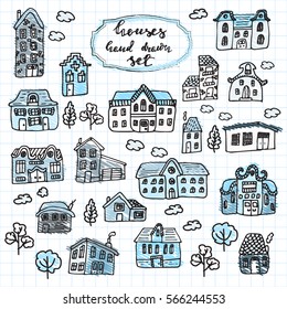 Hand drawn doodle street homes. Sketch vector set of houses in doodle style.  Cottage symbol collection.  Vector illustration.