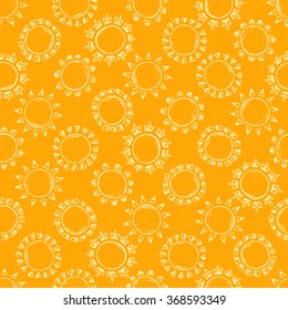 Hand drawn doodle Sun Seamless pattern. Yellow sunny background.