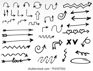 Hand drawn doodle vector arrows.