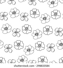Hand drawn doodle vector floral pattern. Blossoming flowers. Simple and graphic illustration.