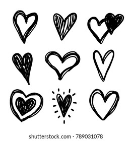 Hand drawn doodle vector hearts set