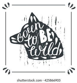 Hand drawn doodle wild wolf silhouette with lettering quote born to be wild. Card, postcard, background with wolf, wild dog