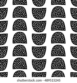 Hand drawn doodles seamless repeating pattern in black and white.