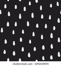 Hand drawn dots and spots seamless vector pattern. Abstract organic doodle shapes. Black and white simple brush texture. Strawberry-flavored decorative background design.
