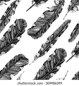 Hand drawn dotted feathers set on white background
