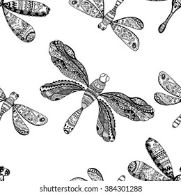 Hand drawn dragonfly ink doodle seamless pattern. Sketched insects on white background. Black and white monochrome fly flora print.