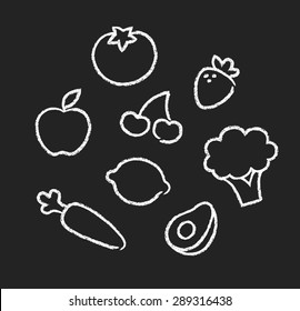 Hand drawn drawings of fruits and vegetables. Simple chalk doodles on blackboard.