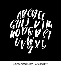 Hand drawn dry brush font. Modern brush lettering. Grunge style alphabet. Vector illustration.