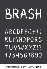 Hand drawn dry brush font. Modern brush lettering. Grunge style alphabet. Chopped white vector type isolated on the dark background.