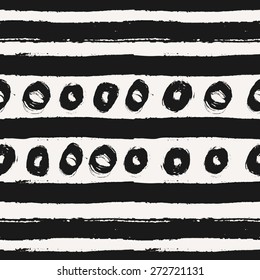 Hand drawn dry brush strokes seamless pattern. Abstract hand painted repeat texture in black and off-white.