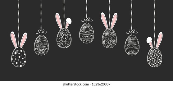 Hand drawn Easter eggs with funny rabbit ears. Vector