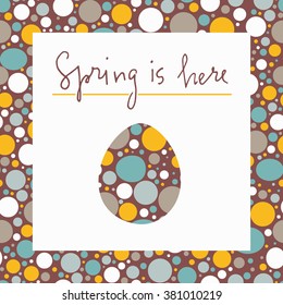 Hand drawn easter greeting card. Cutout silhouette of easter egg on colorful dotted background and hand lettering quote "Spring is here". Good choice for print and web.
