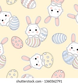 Hand drawn Easter seamless pattern with bunnies and easter eggs on yellow background.