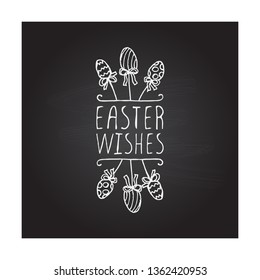 Hand drawn easter typographic element on chalkboard background. Easter wishes. Suitable for print and web