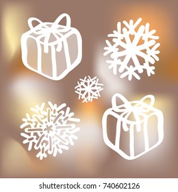 Hand drawn elements for Christmas or New Year card - gift boxes and snowflakes. Blurred soft-beige background.