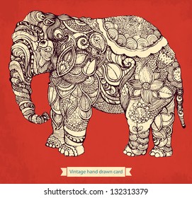 Hand drawn elephant with elements of a flower ornament