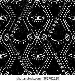 Hand drawn ethnic pattern with eyes. Grungy ornamental background for wrapping, wallpaper, textile, cards, banners, flyers