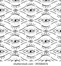 Hand drawn ethnic pattern with eyes. Grungy ornamental background for wrapping, wallpaper, textile, cards, banners, flyers