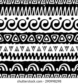 Hand drawn ethnic seamless background with grunge effect. Tribal pattern for your design. Use for fabric, pattern fills, web page background. Zigzag and stripe line