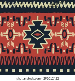 Hand drawn ethnic seamless background with grunge effect. Colored tribal pattern for your design. Use for fabric, pattern fills, web page background. Zigzag and stripe line