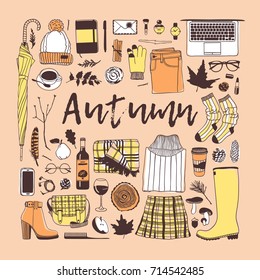 Hand drawn fall fashion illustration. Creative ink art work. Actual vector drawing. Autumn set: glove, watch, glasses, phone, headphones, jumper, jacket, skirt, boots, socks, bag, umbrella, hat