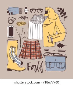 Hand drawn fall fashion illustration. Creative ink art work. Actual vector drawing. Autumn set: glove, watch, glasses, phone, headphones, jumper, jacket, skirt, boots, socks, bag