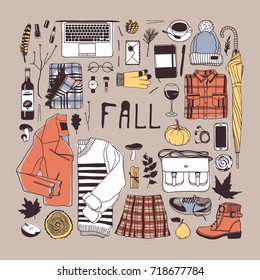 Hand drawn fall fashion illustration. Creative ink art work. Actual vector drawing. Autumn set: glove, watch, glasses, phone, headphones, jumper, jacket, skirt, boots, socks, bag, umbrella, hat