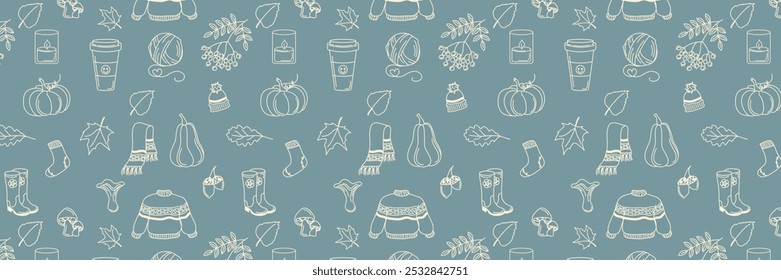 Hand drawn fall patterns on blue background, seamless template. Scarf, candle, hot coffee, tea, socks, sweater, scarf and hat, ball of wool thread, leaves, berries, acorns and mushrooms