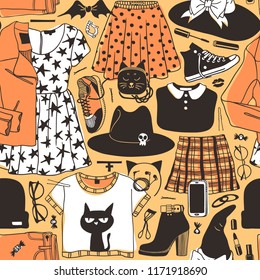 Hand drawn fashion background. Creative ink art work. Actual vector seamless pattern. Halloween set: leather jacket, skirt, hat, boot, sock, snickers, bag