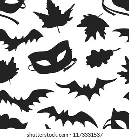 Hand drawn fashion background. Creative ink art work. Actual vector seamless pattern. Halloween set: autumn leaves, mask, bat