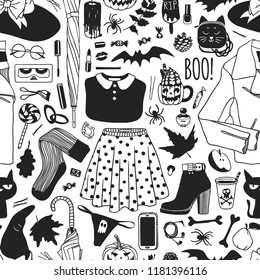 Hand drawn fashion background. Creative ink art work. Actual vector seamless pattern. Halloween set: leather jacket, skirt, hat, boot, sock, snickers, bag