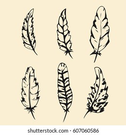 Hand drawn Feather set. Sketch silhouette feathers in outline style vector illustration isolated.