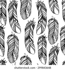 Hand drawn feathers seamless pattern