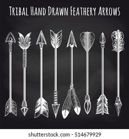 Hand drawn feathery arrows collection on chalkboard background. Vector illustration
