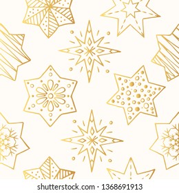 Hand drawn festive golden stars seamless pattern. Christmas decoration with glitter elements. Vector holiday gift wrapper. Gold fancy background. 