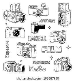 Hand drawn film photo cameras set. Vector illustration.