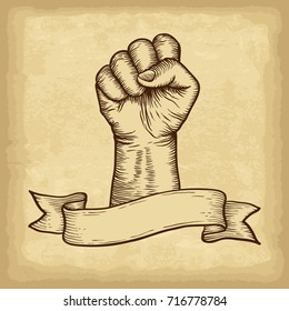 Hand drawn fist with ribbon banner. Old paper texture background. Engraved style vector illustration. Element for you design works.