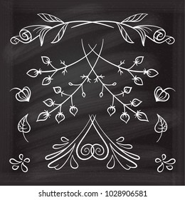 Hand drawn floral elements set on the chalkboard.