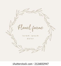 Hand drawn floral frame with a branch with leaves. Elegant leaf logo template. Vector illustration for labels, 
branding business identity, wedding invitation